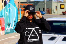 Load image into Gallery viewer, Class_PolishFounderhoodiebycarholdingbrim670.jpg